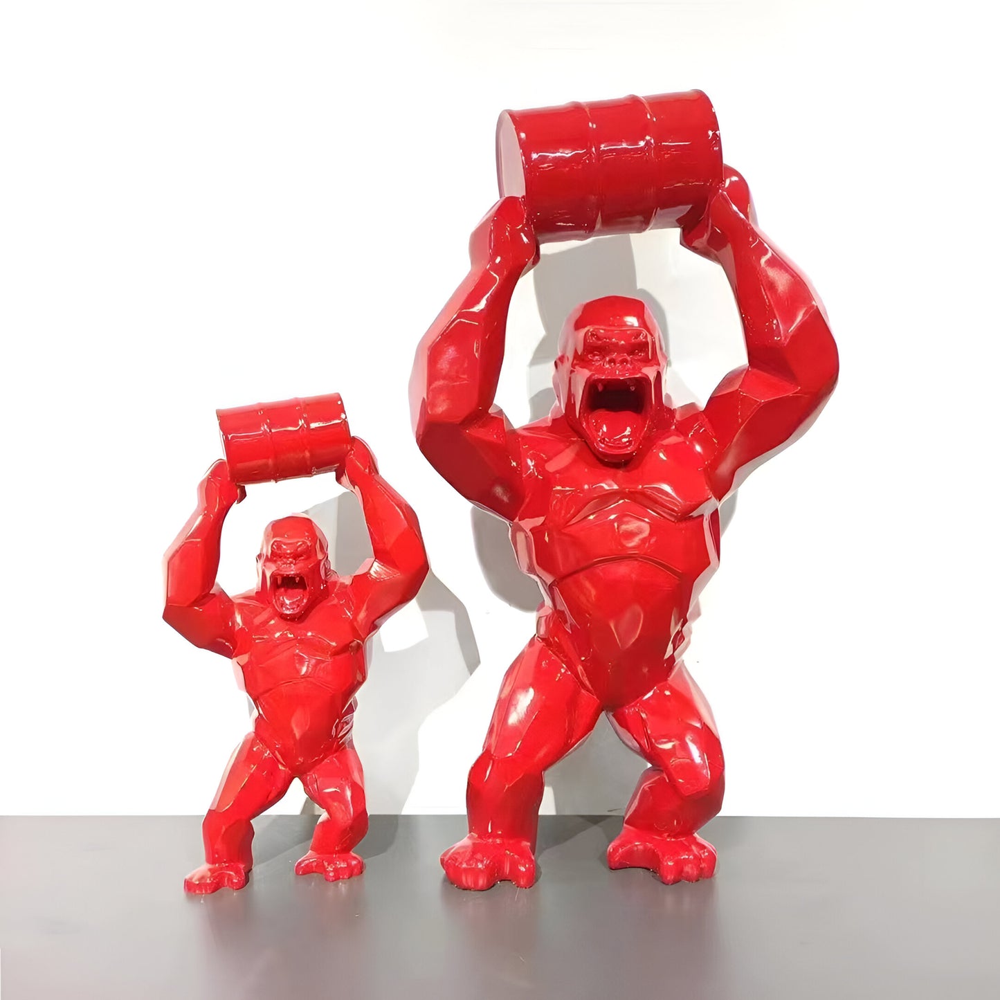 Red Gorilla Statue with Barrel